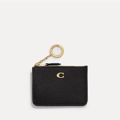 A classic design for life on the go, Coach's Mini ID wallet keeps smaller payment essentials sleekly stowed away. Styled into a compact pocket size, it is made from black crossgrain leather with two card slots, a receipt pocket and a zipped compartment for coins. The ubiquitous 'C' monogram sits at the front in gold-tone detail along with a O-ring purse charm. Classic Coach Card Holder For Travel, Classic Coach Coin Purse With Coin Pocket, Classic Compact Coach Coin Purse, Classic Coach Coin Purse, Classic Coach Coin Purse For Everyday Use, Classic Coach Card Holder For Everyday Use, Classic Coach Card Holder, Classic Coach Leather Coin Purse, Classic Coach Coin Purse Gift