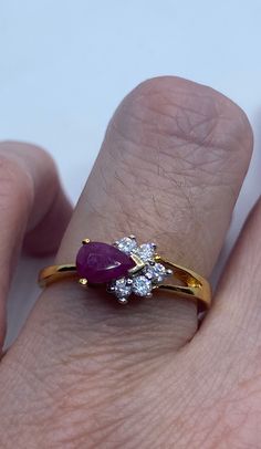 Vintage Pink Ruby Golden 925 Sterling Silver Band Ring https://www.etsy.com/listing/1195005509/vintage-pink-ruby-golden-925-sterling?utm_source=crowdfire&utm_medium=api&utm_campaign=api Brilliant Cut Ruby Cluster Ring As Gift, Gold Pear-shaped Cluster Ring Gift, Pear-shaped Vs Clarity Diamond Ring As Gift, Pear-shaped Diamond Ring With Vs Clarity As Gift, Diamond Teardrop Ring For Gift, Teardrop Hallmarked Ring For Anniversary, Teardrop Diamond Ring With Gemstone As Gift, Teardrop Diamond Ring With Gemstone For Gifts, Ruby Ring With Vs Clarity For Gift