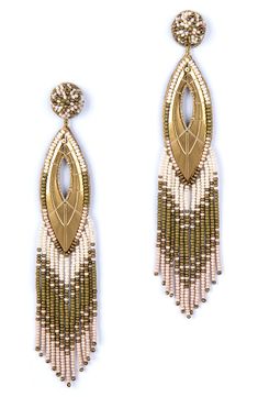 Movement and shine define these fringey drop earrings that are delicately strung with beads. 4" drop; 3/4" width Post back Glass/textile/synthetic/goldtone plate/leather Imported Fringe Dangle Chandelier Earrings, Gold Beaded Fringe Dangle Tassel Earrings, Gold Beaded Fringe Tassel Dangle Earrings, Gold Beaded Fringe Dangle Earrings, Gold Beaded Dangle Earrings With Tassels, Gold Tassel Earrings With Dangling Beads, Gold Beaded Fringe Tassel Earrings, Gold Bohemian Beaded Tassel Earrings, Elegant Gold Tassel Earrings With Beaded Fringe