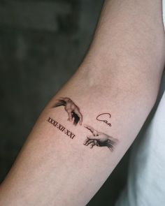 a person with a tattoo on their arm that says, crazy day and two birds