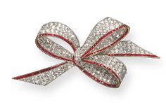 AN ELEGANT BELLE EPOQUE DIAMOND AND RUBY BOW BROOCH. Set with old mine and old European-cut diamonds, accented by calibré-cut ruby trim, mounted in platinum and gold (with concealed pendant loops, one small ruby missing), circa 1915 Bow Brooch, Large Image, Bow Jewelry, Diamond Brooch, Fabulous Jewelry, I Love Jewelry, Art Deco Jewelry, Belle Epoque, Antique Jewellery