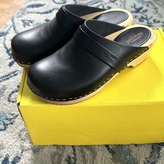 Black Swedish Hasbeens- Swedish Husband Clogs. Size 38. Vegetable Tanned Leather. 47 Mm/1.85 Inches (Height). Excellent Condition. Brand New Without Tags. Classic Black Clogs With Cushioned Footbed, Classic Black Closed Toe Mules, Classic Black Mules With Cushioned Footbed, Black Closed Toe Clogs With Removable Insole, Black Comfortable Clogs With Leather Sole, Black Closed Toe Clogs With Cushioned Footbed, Comfortable Black Clogs With Leather Sole, Classic Black Clogs With Reinforced Heel, Black Slip-on Clogs With Reinforced Heel