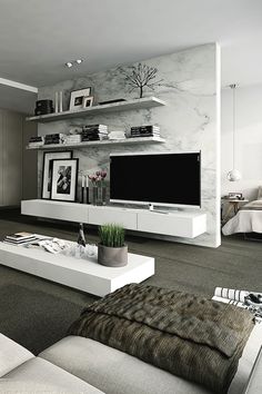 a modern living room with white furniture and marble wallpaper on the walls, along with a large flat screen tv