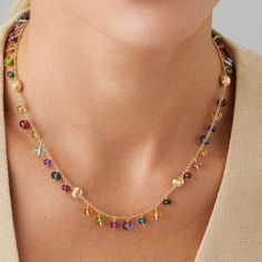 Available to Order (Orders Placed Today Will Ship in 4-6 Weeks) This exquisite necklace boasts a mix of colored gemstones and 18K yellow gold beads, finely hand-engraved with the ancient Florentine technique. With its intense hues and sophisticated design, this necklace adds the perfect pop of color to any outfit. 18K Yellow Gold Africa Gemstones Multi-Colored Gemstones 16.5 Inches Luxury Multicolor Briolette Necklaces, Luxury Multicolor Briolette Necklace, Luxury Multicolor Briolette Jewelry, Gold Artisan Multi-stone Necklaces, Gold Artisan Multi-stone Necklace, Artisan Gold Multi-stone Necklaces, Gold Multi-stone Necklace With Spiritual Style, Gold Multi-stone Spiritual Necklace, Yellow Gold Multi-stone Spiritual Necklace