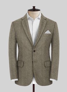 Wrap yourself in the epitome of luxury and timeless design with our Italian Highlander Stone Beige Herringbone Tweed Suit. Meticulously crafted from pure wool, this exquisite fabric marries unparalleled craftsmanship with the robust essence of the highlands. The subtle stone beige hue, interwoven with the classic herringbone pattern, offers a versatile and sophisticated choice for bespoke tailoring. Perfect for making a refined statement at business meetings, upscale social gatherings, or any ev Herringbone Tweed Jacket, Peaky Blinders Suit, Tweed Pants, Tweed Suit, Bespoke Suit, Herringbone Tweed, Green Suit, Grey Tweed, Tweed Suits