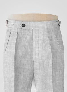 Maintain a distinct professional appearance by adding an extra bit of flair with our Italian Zod Light Gray Linen Trousers. Crafted from linen, these pants will keep you cool, sharp and stylish in summer.   
 
 Look Includes  Italian Zod Light Gray Linen Fabric  Cross Pocket  Forward 2 Pleats  Side Tabs (No Loops)- Arrow Shape  Bottom Cuff (1.5")  Two Welted Back Pockets on Trousers   You can change the look during customization if required. 
 
 Lining: Viscose, Dry Clean. White Linen Suit, Harris Tweed Fabric, Light Grey Suits, Fabric Cross, Scottish Fashion, Professional Appearance, Linen Suits, Herringbone Tweed, Blue Tweed