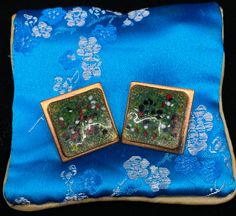 This is a vintage 1950s-1960s matching pair of clasp/clip-on earrings by Matisse, the enameled-jewelry arm of Renoir of California. The name of the design is unknown; the enamel is green with flecks of black, white, and red.  The earrings are signed on the back of the clasps (see images). There are no chips or cracks in the enamel, and the lacquer finish is in remarkably good shape for their roughly 60 years of existence. Matisse/Renoir practically pioneered the art of enameled-copper jewelry, and their designs were exquisite. Consequently, there has been a resurgence of interest in M/R jewelry items in recent years -- especially among collectors -- such that it's somewhat difficult these days to reliably find most pieces. Matisse ended operations in 1964, so this is truly a bracelet than Vintage Metal Clip-on Earrings For Gift, Vintage Enamel Clip-on Earrings, Mid-century Handmade Earrings As Gift, Handmade Mid-century Style Earrings For Gifts, Enamel Clip-on Earrings For Evening, Handmade Mid-century Earrings As Gift, Vintage Enamel Clip-on Earrings For Evening, Costume Jewelry Metal Clip-on Earrings For Gift, Metal Clip-on Costume Jewelry Earrings For Gifts