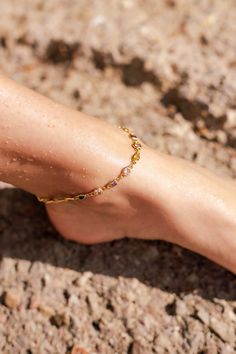 If you are interested in placing a bulk order (50+ pieces), please message us for special pricing.This simple and classic gold crystal anklet adds timeless glamour to your look. Pair with a statement necklace for a little pizazz, or wear alone for a simple, clean look. ► DETAILS  -14K gold filled + cubic zirconia -Length: 8" + 2" extension chain ►Heavenly Materials Our jewellery pieces are delicately handcrafted with gold-fill, sterling silver, stainless steel and gold-plating, combining rich, w Elegant Gold Dangle Anklets, Elegant Adjustable Gold Anklets, Gold Adjustable Dangle Anklets, Adjustable Gold Crystal Anklets, Elegant 14k Gold-filled Gold Anklets, Crystal Anklet, Gold Gift, Bridesmaid Bracelet, Beaded Anklets