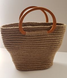 Hand crochet bag. New. Natural jute. There is such an unusual shape jute handmade basket bag with wooden handles ....  Size: height without handle 25 cm/10 inches, top width 38 cm/15 inches, bottom length 24 cm/9.5 inch and width 13 cm/5 inch... Summer Designer Bags, Hand Crochet Bag, Crochet Jute Bag, Bag With Wooden Handles, Cactus Bag, Cotton Beach Bag, Crochet Jute, Handwoven Bag, Market Tote Bag