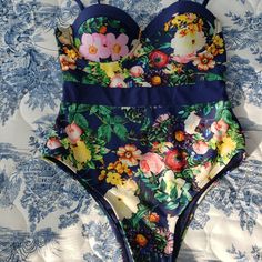 Fashion Nova Floral One Piece Push Up Swimsuit Size S. Push Up Cups. Contrast Waistband. New Without Tags. Never Worn. Comes From Clean Pet And Smoke Free Home. Blue Lined Swimwear For Party, Blue Fitted Swimwear For Summer Parties, Beachwear Party Bodysuit With Floral Print, Fitted Blue Swimwear For Summer Parties, Blue Bodysuit For Beach Party In Spring, Blue Bodysuit For Spring Beach Party, Blue Floral Print Bodysuit For Summer, Blue Summer Party Bodysuit, Party Beachwear Bodysuit With Floral Print