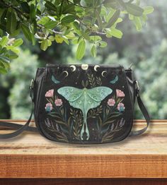 LUNA MOTH Crossbody Saddle Bag, Celestial Butterfly Shoulder Bag, Fairycore Clutch, Vegan Leather Bag, Cottagecore Crossbody Purse, Mystical Moth Messenger Bag, Aesthetic Handbag, Unique Gift for wife, Witchy Bag, Vintage styled Disstressed Bag, Custom made gift, Nature Lover Gift, Mother's Day Gift A fashionable bag will always draw the attention of others.  Made to order, these wonderful handbags will bring something unique to your style! Available in 2 sizes of your choice: BIG BAG: 10.24"(L) Handmade Nature-inspired Travel Bag, Green Nature-inspired Bag For Everyday Use, Nature-inspired Green Bags For Everyday Use, Witchy Bag, Celestial Butterfly, Crossbody Saddle Bag, Bag Aesthetic, Luna Moth, Vegan Leather Bag