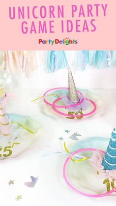 unicorn ring toss game with party delights on the table in pink and blue colors