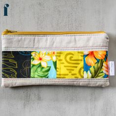 Spice up your pencil case game with our Oyster Taro Patchwork Pencil Cases. The oyster colored pencil case with a colorful patchwork accent adds a touch of fun to your stationery collection. The slim zippered pouch makes it easy to carry all your writing essentials (and maybe a few extra items). This listing is updated regularly with available pencil cases. Shown pencil case is a sample only. Patchwork print pattern will be the same, zipper colors may vary. No two pencil cases are the same. Prod Multicolor Stationery Pouch For Daily Use, Yellow Rectangular Pencil Case With Pen Holders, Multicolor Rectangular Pencil Case For Everyday Use, Multicolor Pencil Case With Zipper Closure, Multicolor Zipper Pouch Pencil Case For Daily Use, Multicolor Pencil Case With Zipper Closure For Organization, Beige Pencil Case With Pen Slots, Multicolor Pencil Case With Pen Slots For Daily Use, Multicolor Pencil Case For Daily Use