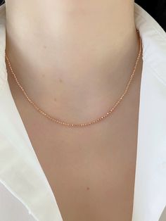 "Shiny And Bright Dainty 14K Rose Gold Beaded Ball Solid Chain. Perfectly Worn Alone Or Layered. Necklace Is Perfect For Any Occasion. A Beautiful Gift She Will Treasure Forever! Jewelry Comes In A Cute Jewelry Box Ready To Present. Model Is Wearing 16\" Chain -All Jewelry Is New And Inspected For Quality Assurance. -Jewelry Is Crafted In Genuine High Quality 14K Gold. -We Do Not Sell Gold Plated Or Gold Filled. Product Detail: Metal: 14k rose gold Weight: 16\" inch 5.2 grams Width: 2mm Closure: Elegant Rose Gold Necklaces With Faceted Beads, Elegant Rose Gold Necklace With Faceted Beads, Rose Gold Beaded Chain Necklace As Gift, Rose Gold Beaded Chain Necklace Gift, Rose Gold Single Strand Necklace With Round Beads, Rose Gold Ball Chain Necklace As Gift, Rose Gold Ball Chain Necklace Gift, Rose Gold Necklaces With Round Tiny Beads, Dainty Rose Gold Necklace With Beaded Chain