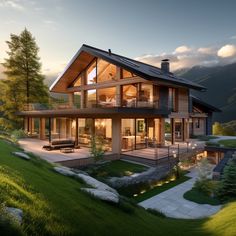 a large house sitting on top of a lush green hillside