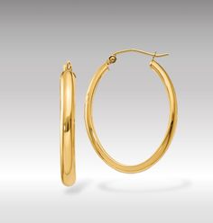 Introducing our 14K Yellow Gold Polished 3.5mm Thick Slim Oval Hoop Earrings, a quintessential piece that marries the timeless elegance of classic hoop earrings with the modern appeal of a minimalist design. These exquisite earrings are crafted from premium 14K yellow gold, polished to a radiant sheen that enhances their sleek and slim profile. The oval shape offers a contemporary twist on the traditional round hoop, providing a flattering elongated look that accentuates the jawline and cheekbones. At 3.5mm thick, these hoops strike the perfect balance between delicate and noticeable, making them versatile enough for both day-to-day wear and special occasions. These hoop earrings are designed for those who appreciate the beauty of simplicity in their jewelry. Their polished finish catches Minimalist Oval Hoop Earrings For Anniversary, Minimalist Oval Hoop Earrings With Polished Finish, Classic Tarnish-resistant Oval Hoop Earrings, Minimalist Oval Hoop Earrings Tarnish Resistant, Minimalist Oval Tarnish Resistant Hoop Earrings, Minimalist Oval Tarnish-resistant Hoop Earrings, Minimalist Tarnish-resistant Oval Hoop Earrings, Everyday Tarnish-resistant Oval Hoop Earrings, Oval Hoop Earrings