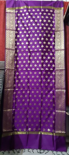 Dupatta length:2.5m Dupatta width:0.9m Warp:Art silk  Weft: zari  Blended Dry clean This dupatta is made of finely woven fabric and is decorated with intricate design and  engravings Banarasi dupattas are characterised by brocade borders & pallus.They often have woven butas. Purple Handloom Dupatta For Diwali, Bollywood Purple Dupatta With Cutdana, Bollywood Style Purple Dupatta With Cutdana, Purple Festive Dupatta With Zari Work, Purple Art Silk Traditional Wear With Sheer Dupatta, Purple Paithani Silk Dupatta With Self Design, Festive Purple Banarasi Silk Dupatta, Purple Banarasi Silk Dupatta For Festive Occasions, Festive Purple Chanderi Dupatta