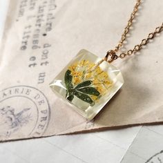 Real pressed flowers, Botanical gift for women, Unique minimalist jewelry, Small pendant for girl, Gift for daughter's birthday. An unusual handicraft as a birthday gift, perfect for a lover of nature and unique jewelry. For women who want to wear unique jewelry in the whole world. Made by me from start to finish with attention to every detail. I put a lot of work, patience and heart into each single piece of jewelry. Personally, I collect and dry plants, which I later use to create.  Pendant si Daughter's Birthday, Flowers Botanical, Daughter Birthday, Small Pendant, Minimalist Jewelry, Pressed Flowers, Resin Jewelry, Gift For Women, Charm Necklace