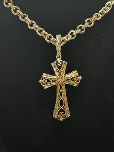 From Gabriel & Company, this filigree cross pendant and chain is cast in 18k/925/Steel yellow gold, sterling silver, and stainless steel. The cross features four genuine diamonds weighing a total of 0.02 carat.  The pendant and chain are both signed Gabriel & Co. The chain is very detailed with 925 Silver chunky links. The chain as well as the bale and the cross pendant are all sterling silver tested. The bale is as unique as the chain and pendant as well.  The pendant has an 18K yellow gold scr Yellow Gold Filigree Cross Pendant Necklace, Gold Filigree Cross Pendant Necklace, Yellow Gold Filigree Cross Jewelry, Gold Filigree Cross Necklace, Gold Cross Necklace With Filigree, Elegant Jewelry With Intricate Design Cross Pendant, Ornate Gold Cross Pendant Necklace, Gold Filigree Cross Jewelry, Gold Cross Pendant With Intricate Design