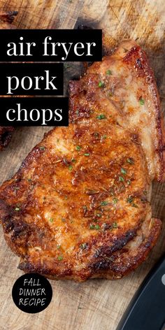 there is a piece of meat on the cutting board with text overlay that says air fryer pork chops