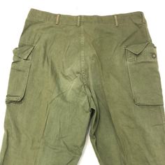 Vintage US Army Pants 1940s-1960s Size: large  Measurements:  waist- 39” length- 46” top to crotch- 16” Retro Wide-leg Cargo Pants, Retro Full-length Bottoms With Cargo Pockets, Retro Wide Leg Pants With Cargo Pockets, Retro Wide Leg Cargo Pants, Vintage Wide-leg Cargo Pants, Vintage Wide Leg Cargo Pants With Side Pockets, Retro High Waist Cargo Pants, Vintage High Waist Pants With Cargo Pockets, Retro Full-length Bottoms With Welt Pockets