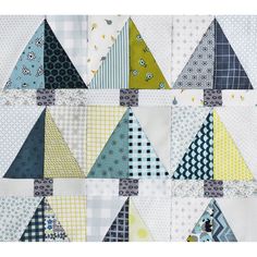 an image of a quilt made with triangles