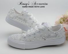 "Beautiful and Romantic wedding sneaker are a perfect accessories for your Special day..These Wedding Chuck Taylor All Star White Color Low Top Converse Sneakers , are embellished with Pearls and Clear Crystal on the Toe and Back , with a White Satin Ribbon shoe lace for tying. This Chuck Taylor All Star Monochrome Low Top runs a half-size large. Handmade to order, so please allow me enough time before your wedding date. Orders are processed and shipped within 7-8 WEEKS of payment., large orders Wedding Chucks Converse, White High-top Sneakers For Wedding, White Round Toe Sneakers For Bridal Shower, Custom White High-top Wedding Sneakers, Custom Wedding Sneakers With Round Toe And Laces, Low-top Lace Wedding Shoes For Bride, White High-top Wedding Sneakers, White Low-top Wedding Shoes, Converse Wedding Shoes Bride