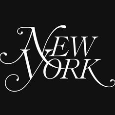 the new york logo is shown in white on a black background with swirls and scrolls