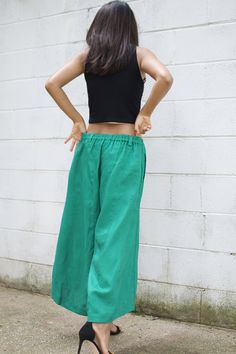 M E A S U R E M E N T S Waist 26 in. up to 40 in. (max with elastic band) Hips up to 54 in. Wide leg circumference 30 in. Inseam 23 in. Pocket 2 pockets Total length 35 in. Material High quality linen fabric M O D E L * Size US4 * Height 5 ft. 4 in. or 163 cm. With or without 4 in. high heels. These pants are a new addition to our linen pants collection. They're made with high quality linen with high end detailing and are tailored to make you look and feel your best! The pants are very roomy wit Green Stretch Parachute Pants, Green Harem Pants With Pockets For Vacation, Green Ankle-length Parachute Pants For Summer, Green Stretch Parachute Pants For Summer, Relaxed Fit Harem Bottoms For Vacation, Green Non-stretch Pants For Vacation, Green Ankle-length Parachute Pants With Elastic Waistband, Green Relaxed Fit Full-length Parachute Pants, Green Relaxed Fit Parachute Pants