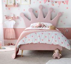 Acting as the perfect statement piece, the Princess Pink Velvet Kids’ Bed boasts a striking crown headboard and beautiful velvet upholstery. Ideal for adding a touch of elegance to any home, the frame is a must for every little princess.       Statement Crown Shaped Headboard Boasting a striking headboard, the Princess Velvet Bed is ideal for any little princess. Delicately cut into the shape of a crown, the frame acts as the perfect statement piece in any bedroom, and helps bring sleep spaces to life.         Pink Upholstery Suits Range Of Homes Upholstered in luxury velvet, the Princess Kids’ Bed adds a high-end feel to any child’s bedroom - as well as a hint of fun! Finished in a beautiful shade of pink, the frame easily complements a wide range of interior styles.         Sprung Slatte Upholstery Shop, Shaped Headboard, Bedroom Upgrade, Princess Bed, Princess Kids, Princess Room, Kids Bed, Velvet Bed, Beds & Bed Frames