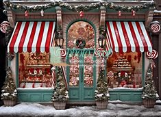 a store front decorated with candy canes and christmas decorations