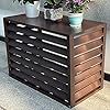 a wooden dresser with flowers on top and potted plants in the bottom drawers