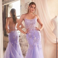 The Beautiful And Flattering Mermaid Silhouette, With Its Subtle But Stunning Details, Will Make You Look Fantastic No Matter Where You Are. Its Crystal-Embellished Floral Details Add Just Enough Sparkle To The Bodice Of This Dress, Drawing Attention To Its Beauty. Length: Long Color: Lavender Neckline: Off Shoulder Silhouette: Mermaid Sleeve: Sleeveless, Straps Back: Lace Up Embellishments: Floral Applique, Sequins Occasion: Romantic Date/Evening/Dinner, Wedding/Bridesmaid, Graduation, Fashion Tulle Pattern, Lavender Prom Dresses, Cinderella Divine, Layered Tulle Skirt, Boned Bodice, Trumpet Gown, Sleeveless Dresses, Mermaid Silhouette, Mermaid Evening Dresses