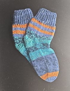 Hand knitted socks Size: 22/23 Material composition: 75% virgin wool 25% polyamide Care instructions: Washable at 40o Celsius Not suitable for dryers Do not use fabric softener These hand-knitted socks in size 22/23 are made from a high-quality blend of virgin wool and polyamide. They offer the perfect combination of warmth, comfort and durability. The virgin wool provides natural warmth and breathability, while the polyamide content makes the socks robust and durable. Please follow the care ins Hand Knit Socks, Knitted Socks, Dryers, Fabric Softener, Socks And Hosiery, Knitting Socks, Hosiery, Hand Knitting, Gender Neutral