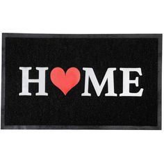 a black door mat with the word home written in white letters and a red heart