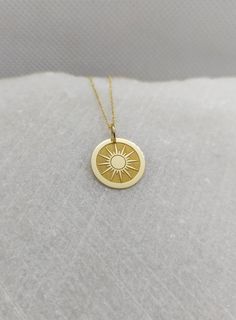 "14K Real Solid Gold Necklace, Hallmarked on the back of your pendant for certification! Sun Necklace - Engraved Sunshine Charm - Gold Graduation Charm - Gold Sun Pendant ▪️ A beautiful and clean engraved Sun pendant made out of 14K Solid Real Gold. Available only in yellow gold! Dimensions - Small - 13x13mm / 0.51 x 0.51 inches Medium - 14x14mm / 0.55 x 0.55 inches Big - 15x15mm / 0.59 x 0.59 inches Necklace Length - You can choose your chain length from 35CM to 50CM. The pendant is available a 14k Yellow Gold Cadmium-free Necklace, Cadmium-free 14k Yellow Gold Necklace, Cadmium-free 14k Gold Round Jewelry, Cadmium-free Yellow Gold Round Necklaces, Cadmium-free Yellow Gold Round Necklace, Sun Locket, Sun Pendant Gold, St Christopher Necklace, Sunshine Necklace