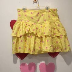 Yellow Ruffle Skirt From My Violet With Pink Hearts All Over. Has A Side Zipper.Never Been Worn. Yellow Ruffled Bottoms For Spring, Yellow Tiered Skirt For Day Out, Yellow Ruffled Bottoms For Day Out, Cute Fitted Yellow Bottoms, Yellow Ruffled Skirt For Summer, Yellow Ruffled Skirt For Spring, Yellow Tiered Mini Skirt For Summer, Cute Yellow Skirt For Spring, Yellow Cotton Skirt For Day Out