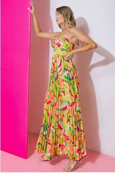 The Pura Vida Jumpsuit, a stunning piece that combines comfort and style effortlessly. Crafted with a vibrant tropical print, this jumpsuit is perfect for any occasion, whether it's a beach vacation, a garden party, or a casual day out. e.Laniese founder wears a size Small in this jumpsuit. Summer Garden Party Multicolor Print Maxi Dress, Tropical Style Maxi Dress For Beach Season Party, Multicolor Floral Print Jumpsuit For Day Out, Vibrant Print Maxi Dress For Spring And Summer Parties, Multicolor Floral Print Jumpsuits And Rompers For Day Out, Vibrant Green Maxi Dress For Day Out, Spring Maxi Dress With Vibrant Print For Summer Parties, Multicolor Floral Jumpsuits And Rompers For Day Out, Multicolor Tropical Strapless Dress