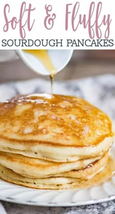 a stack of pancakes with syrup being drizzled on top and the words, soft & fluffy sourdough pancakes