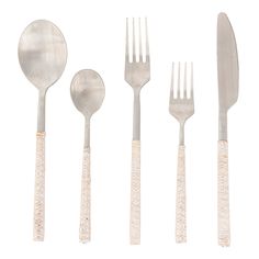 five forks, two spoons and one knife on a white background with sequin accents