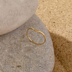 Let The Wishbone Stacking Ring to bring luck to your life. Crafted in 14k solid gold to be the perfect gift for special occasions. It is convenient to be worn alone or stacked. - Made in 14k solid gold - Band Width: 1.20 mm / 0.047 inches - Thickness: 1.20 mm / 0.047 inches -This product comes with iconic Norm Jewels gift box Classic Gold Stackable Heart Ring, 14k Yellow Gold Open Midi Ring, Recycled Gold Open Band Stackable Rings As Gift, Stackable Yellow Gold Open Heart Ring, Stackable Yellow Gold Heart Open Ring, Recycled Gold Stackable Rings With Open Band, Stackable Open Band Rings In Recycled Gold As Gift, 14k Gold Stackable Promise Rings With Open Ring Design, Recycled Gold Stackable Open Band Rings As Gift