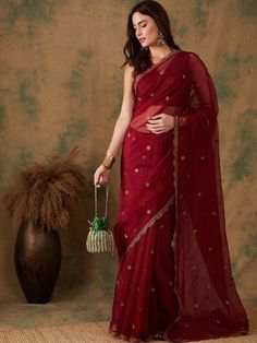 Maroon sareeFloral embroidered saree with embellished borderThe saree comes with an unstitched blouse pieceThe blouse worn by the model might be for modelling purpose only. Check the image of the blouse piece to understand how the actual blouse piece looks like. Administrative Outfits, Classy Sarees Elegant, Maroon Saree Look, Red Saree Party Wear, Saree Styles Modern Classy, Indian Wedding Reception Outfits, Chinese Fancy Dress, Simple Saree Designs, Embroidered Sarees