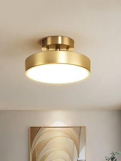 a living room scene with focus on the ceiling light