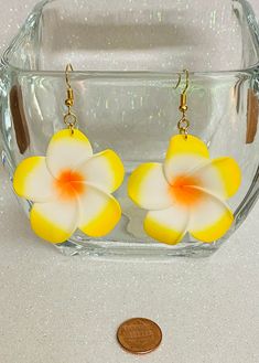 Hawaii 1.75 inch foam gold plated ear hooks dangling earrings. The drop length is 2.5 inches. The gold plated earring hooks are nickel free and tarnish resistant making them great for sensitive ears. These fun and lightweight earrings are a great gift for someone special! Yellow Earrings For Beach With Ear Wire, Cute Summer Dangle Flower Earrings, Yellow Earrings With Ear Wire For Beach, Yellow Beach Earrings With Ear Wire, Yellow Flower Drop Earrings With Ear Wire, Handmade Yellow Flower Earrings For Beach, Yellow Dangle Hoop Earrings With Ear Wire, Hawaii Earrings, Hypoallergenic Yellow Drop Flower Earrings