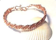 Wire Woven Twist Design Bangle Bracelet - Etsy Adjustable Copper Wire Bangle Bracelet, Adjustable Copper Wire Bangle, Handmade Copper Wire Bangle Bracelet, Gold Spiral Wire Wrapped Bracelets, Adjustable Wire Wrapped Braided Bracelet As Gift, Adjustable Rose Gold Wire Wrapped Bracelets, Adjustable Bangle With A Modern Twist As A Gift, Adjustable Bangle With A Modern Twist For Gifts, Modern Twist Adjustable Bangle As A Gift