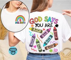 a woman wearing a t - shirt that says god says you are crayons