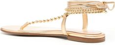 Step out in style with these chic leather thong sandals. The gold-tone metallic effect bead embellishment adds a touch of glamour to any outfit, while the tie-fastening ankle strap ensures a perfect fit for all-day comfort. Open toe Round toe Branded leather insole Flat leather sole Cheap Gold T-strap Sandals For Summer, Cheap Gold Open Toe T-strap Sandals, Cheap Gold Sandals For Summer, Cheap Gold Flats With Flat Heel, Cheap Gold Sandals For Spring, Cheap Gold Flip Flops For Summer, Cheap Gold Sandals For Party, Gold Flat Sandals Macy's, Luxury Gold Sandals For The Beach