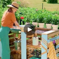 a woman standing next to a table filled with potted plants and gardening equipment on top of a lush green field