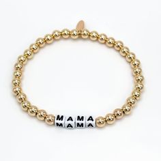 Made for YOU. Our Custom Gold-filled, 5mm beaded bracelet can be personalized with black or white letters. If you are looking for a genuine customizable gift, then look no further. Our Jonesy Wood Custom Gold-filled bracelet is the perfect gift for any special occasion. Custom words available, just choose which color (black or white) and place a note at checkout letting us know what word you prefer. available in white block letters or round black letters 14k gold filled 5mm smooth beads Stretchy Mama Bracelet, Block Letters, Jewelry Cleaning Solution, Customizable Gifts, White Letters, Gold Dipped, Black Letter, Gold Wood, Block Lettering