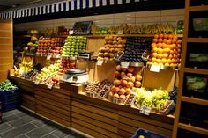 a store filled with lots of fruits and vegetables